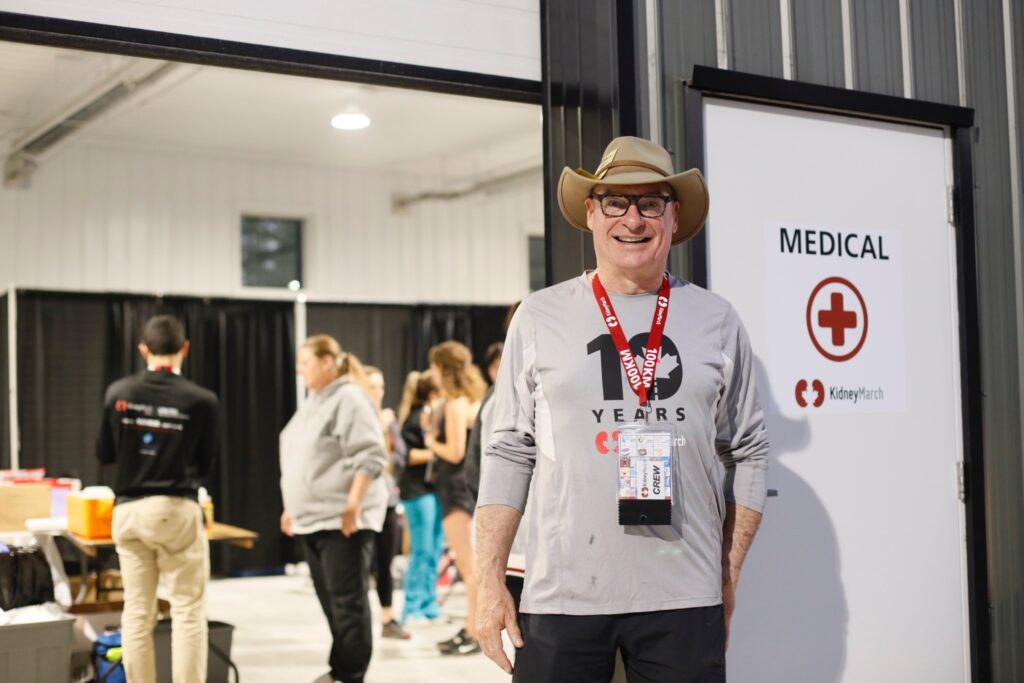 Photo of Dr. Nairne ScottDouglas in front of the Kidney March Medical building.